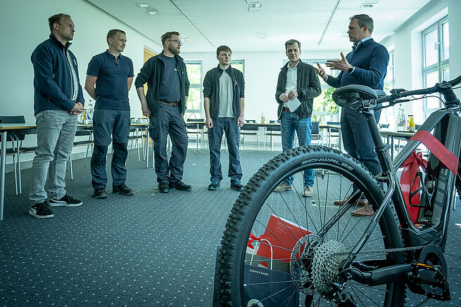 Photo 2: Award ceremony with Daniel Pfeifer, Markus Rasche and Florian Stappenbeck